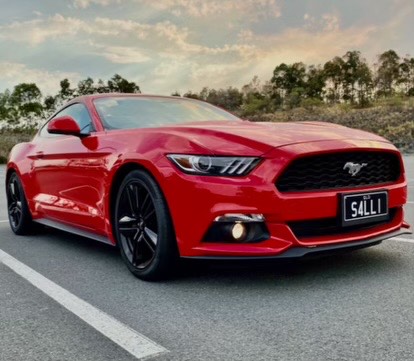 A Red Mustang car